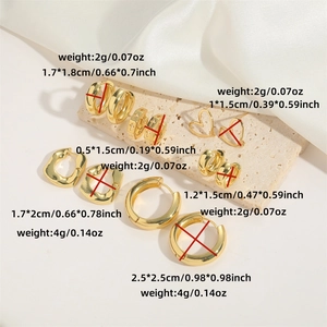 Set of 6 gold C-shaped chunky hoop earrings with size and weight specs on stone