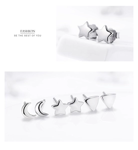Makroaufnahme von minimalistischen S925 Sterling Silber Stern, Mond und Dreieck Ohrsteckern