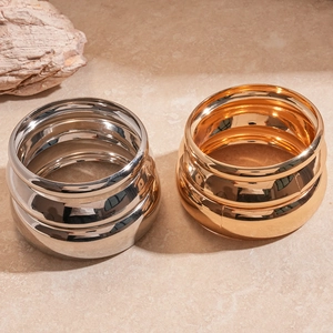 Minimalist chunky metal geometric bangle set in polished gold and silver finish