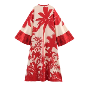 Off-white tropical maxi kimono with red palm tree print and wide sleeves for beach vacation