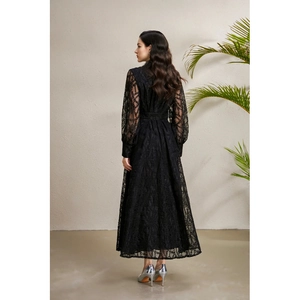 Elegant black lace maxi dress with V-neck and lantern sleeves, shown from the back view