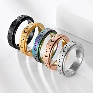 Rotating stainless steel rings set in five colors with star moon and glitter texture