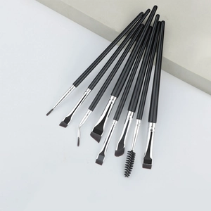 Macro detail of 8-piece eye makeup brush set with synthetic bristles and black handles