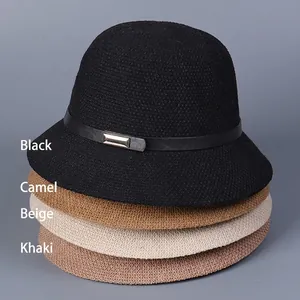 Women's knit bucket hats in black, beige, and khaki with elegant gold buckle decor