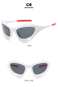Detail view of white Y2K sports sunglasses with grey polarized lenses and red non-slip tips