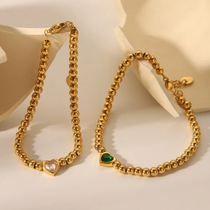 18K gold plated stainless steel beaded bracelet with clear and green heart gemstones