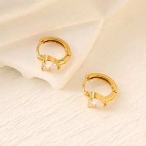 Detail of 18K gold stainless steel hoop earrings with heart-shaped zircon stones