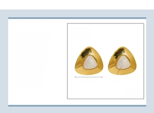 Macro shot of 23.67mm 18K gold plated stainless steel heart earring with white resin