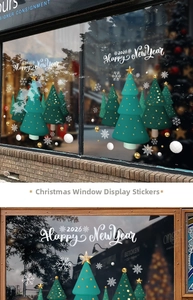 Close-up of green Christmas tree window stickers with Happy New Year 2026 text