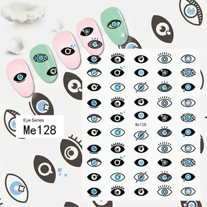 Detailed view of Eye Series Me128 nail stickers with blue evil eye designs