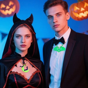 Neon green Halloween necklaces with moon bat charms worn by models in party setting