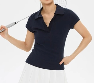Navy short-sleeved Polo shirt with white tennis skirt and badminton racket details