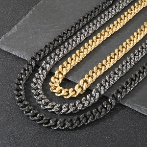 Men's Cuban chain necklace in gold, silver, and black with hammered metal texture