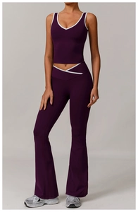 Detail of plum sports vest with white piping and high-elastic matte textured fabric