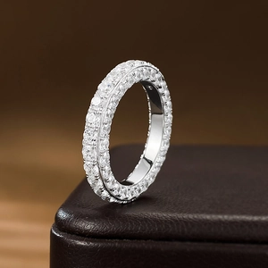 Luxurious silver eternity ring with three sides of sparkling pave set cubic zirconia