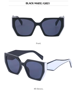 Front and 45-degree angle view of cat-eye sunglasses with black and white frames