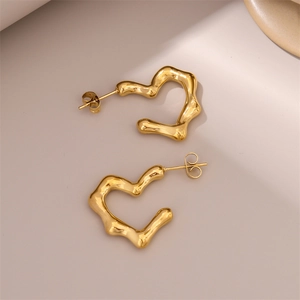 French style gold wavy heart shaped earrings with liquid metal design for women