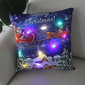 Merry Christmas LED glowing pillow featuring Santa sleigh on soft navy blue plush fabric