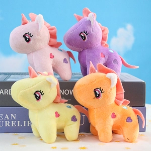 Plush unicorn keychains set in pink, purple, yellow, and orange with heart embroidery