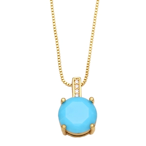 Detail of round light blue gemstone pendant with cubic zirconia on a gold chain