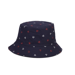 Reversible navy bucket hat with red and white anchor print for sun protection