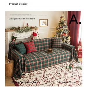 Detail of red and green plaid Christmas sofa cover made with natural protein fiber