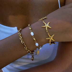 Three-layer gold titanium steel bracelet set with white freshwater pearls and starfish charm