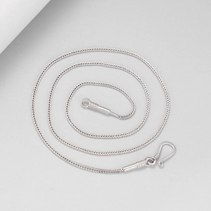 Silver woven keel necklace chain with spiral clasp for a minimalist layered jewelry look