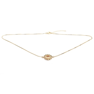 Collier doré œil maléfique avec pierre rouge centrale et chaîne à mailles fines