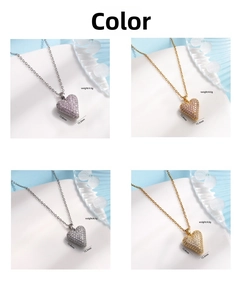 Detail of four heart-shaped pendants with micro-pave cubic zirconia in various colors