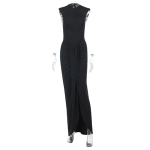 Close-up of side ruching details on black bodycon maxi dress with backless design