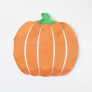 Detail of orange pumpkin shaped paper napkins for Thanksgiving party table decoration