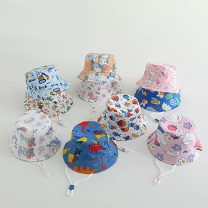 Kids cotton bucket hats with dinosaur and unicorn prints featuring adjustable windproof cords