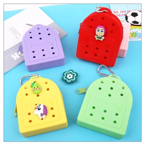 Mini silicone hole bags in bright colors with DIY charms and metal clip attachments