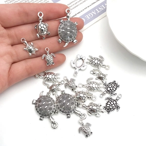 Set of 18 vintage silver turtle pendants in various sizes for DIY jewelry making