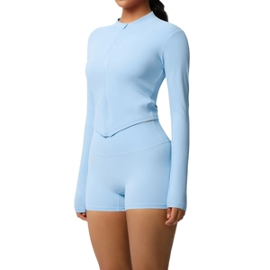 Light blue high-stretch yoga set with zip-up long sleeve top and high-waist biker shorts