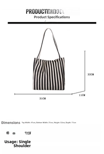 Detailed dimension guide for black and white striped canvas tote bag showing size parameters