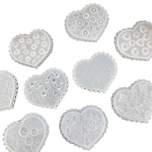 Set of 9 heart-shaped translucent silicone molds for DIY nail art and resin crafts