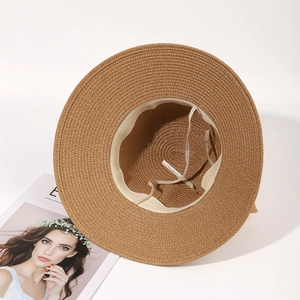 Brown wide brim straw beach hat with adjustable drawstring and inner sweatband
