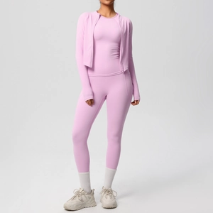 Three-piece pink yoga set detail with slim-fit long sleeve jacket and high-waist leggings