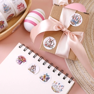 Easter bunny and floral round stickers on gift boxes and notebooks for decoration