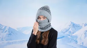 Grey winter knitted balaclava hood with faux fur pompom and fleece lining for women