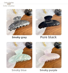 Detailed color options of large iridescent acrylic hair claws in four elegant finishes