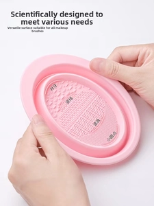 Pink silicone makeup brush cleaning bowl with four functional textures for various brush types