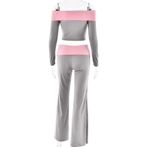 Rear view of grey off-shoulder top with pink trim and matching flared trousers set