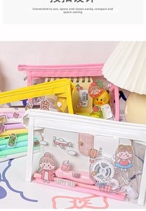 Close-up of three clear PVC stationery pouches in white, yellow, and pink frames