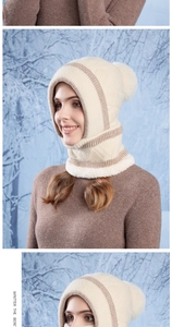 Detail of winter balaclava with plush fleece lining and large pom-pom on the top