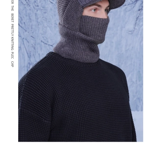 Close-up of dark grey knitted balaclava with visor for winter thermal protection