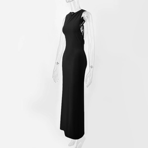 Side view of sleek black slim fit maxi dress featuring a cross-drape halter design
