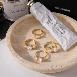 Classic 18K gold plated stainless steel rings with white cubic zirconia in assorted shapes